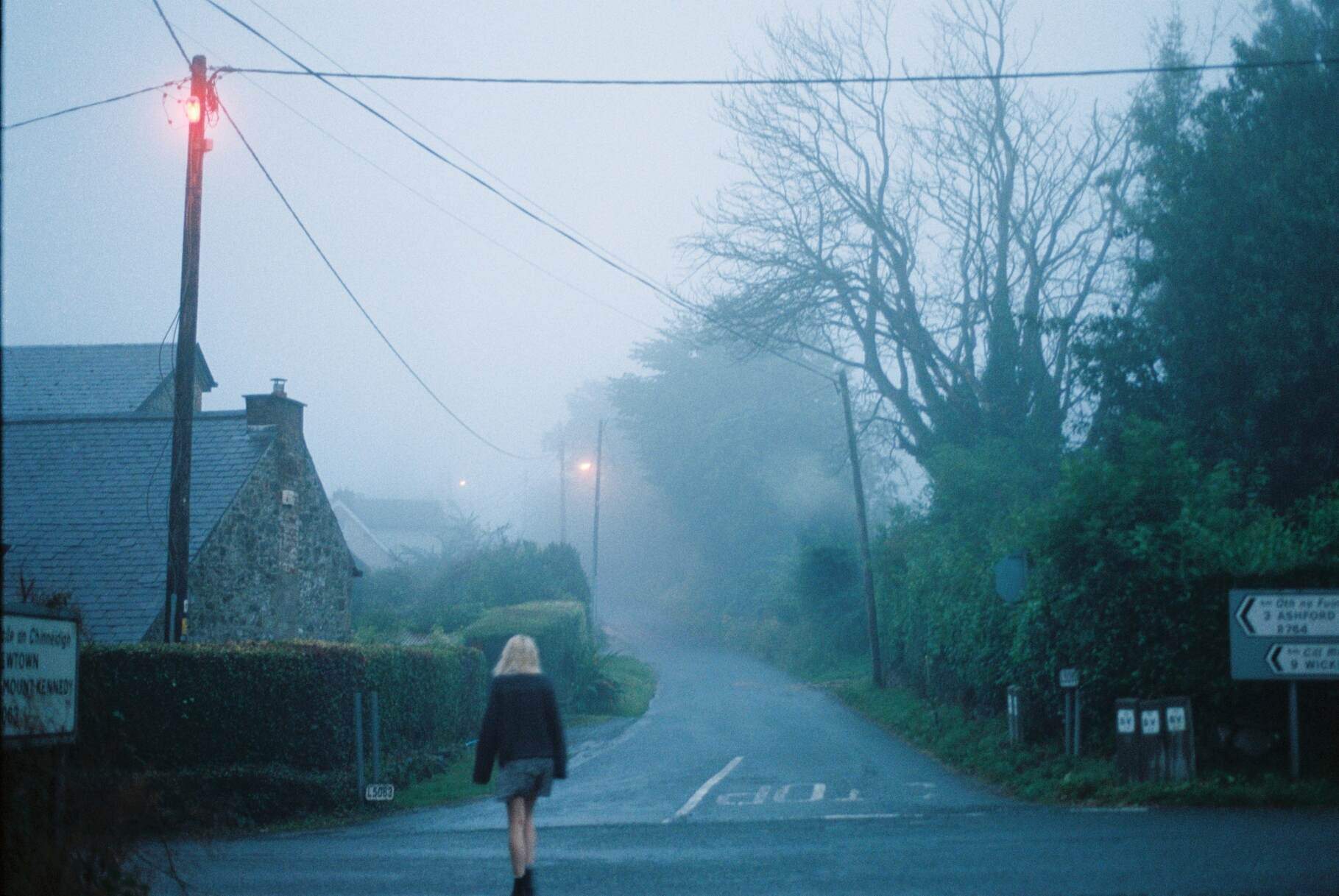 blonde woman in mist
