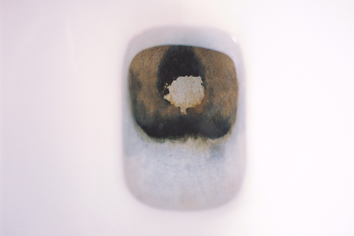 abstract art. Rusted bue oblong on white background
